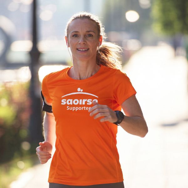 Woman running wearing a Saoirse t-shirt