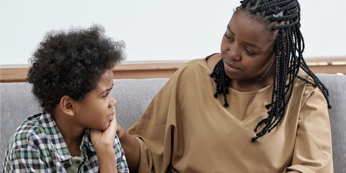 Mother comforting son