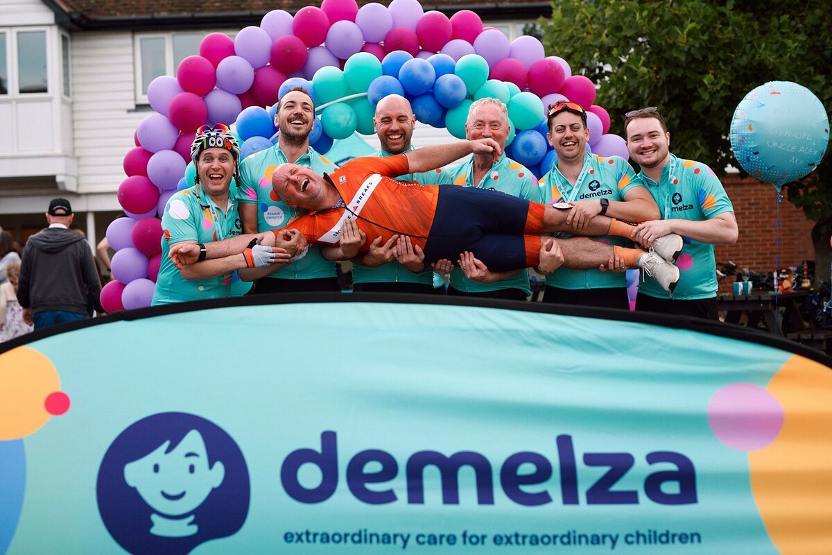 Cyclists celebrate after Demelza bike ride